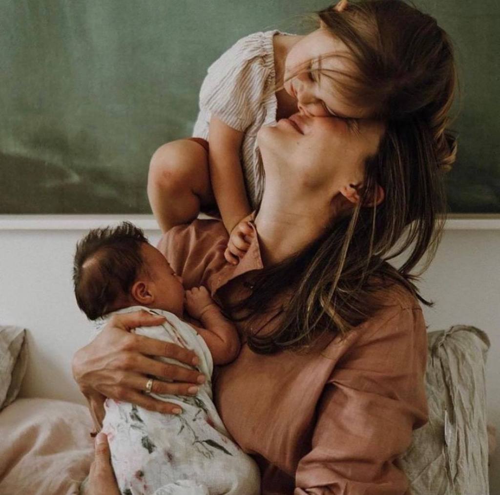 mother playing with her children